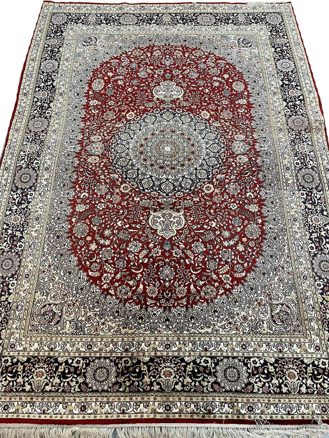 VERY FINE PURE SILK HEREKE DESIGN RUG, 190cm x 126cm.