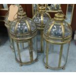 STORM LANTERNS, a set of four, gilt metal, 55cm H approx. (4)