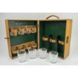 TRAVELLING DRINKS CASE, with eight cut glasses and room for three bottles, in tanned leather, 35cm H