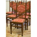 DINING CHAIRS, a set of six, circa 1900, walnut in Liberty manner with red foliate patterned