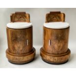 ART DECO BEDSIDE CABINETS, a pair, burr walnut each circular with marble top, bow front door and