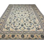 FINE PERSIAN ISPHAHAN DESIGN CARPET, 419cm x 300cm, palmette and vine jade field.