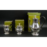 CHRISTOFLE 'MALMAISON' SILVER PLATED COFFEE POT, cream pitcher and sugar bowl all in original boxes.