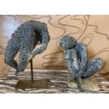 FRENCH SCHOOL 'Crouching and Stretched Figures', metallic wire sculptures, a pair, one with monogram