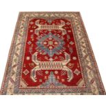 FINE EAGLE DESIGN KAZAK CARPET, 342cm x 241cm.