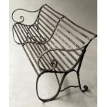 REGENCY PARKLAND BENCH, 19th century estate bench wrought iron with scroll arms and swept