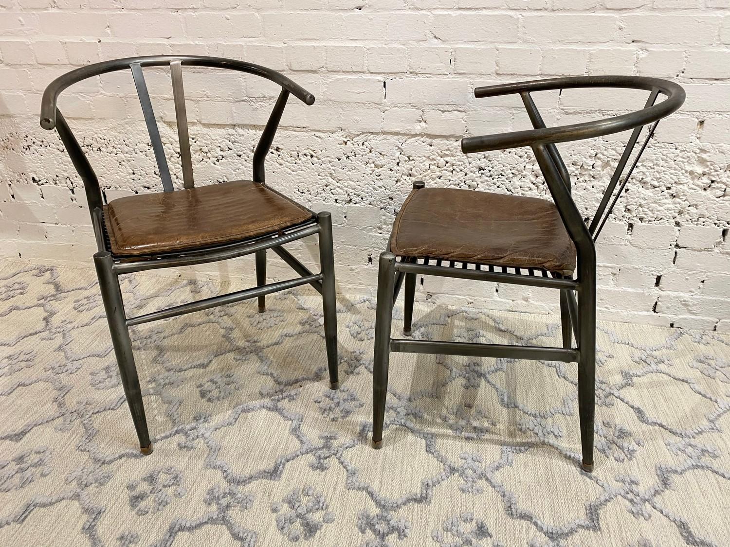 AFTER HANS J WEGNER WISHBONE STYLE CHAIRS, a pair, vintage steel framed with stitched brown