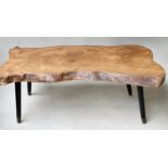 RUSTIC TABLE, naturalistic elm tree section with bark and ebonised tapering metal capped supports,