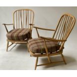 ERCOL ARMCHAIRS, a pair, vintage beech and bentwood framed with stick backs and splay supports, 72cm