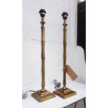 FAUX BAMBOO TABLE LAMPS, a pair, gilt metal, 67.5cm H. (2)