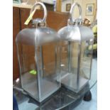 LANTERNS, a set of three, contemporary polished metal, 62cm H. (3)