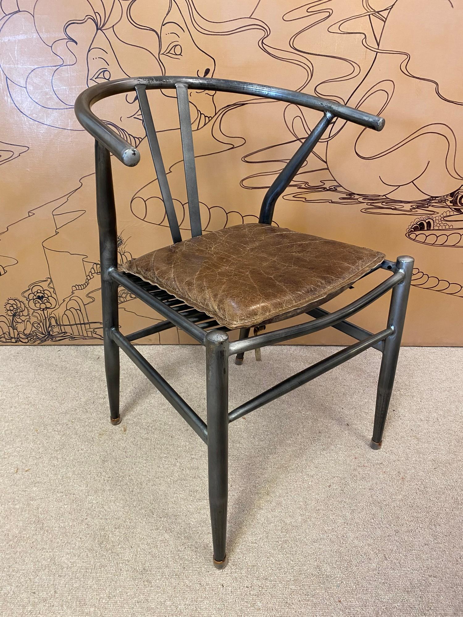 AFTER HANS J WEGNER WISHBONE STYLE DESK CHAIR, vintage steel framed with stitched brown leather seat