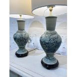 TABLE LAMPS, a pair, Chinese ceramic vase form decorated with fish, with carved hardwood bases and