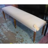 HALL SEAT, neutral upholstery on turned reeded supports, 151cm x 40cm x 45cm.