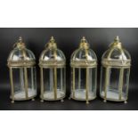 STORM LANTERNS, a set of four, gilt metal finish, 55cm H approx. (4)