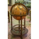 DRINKS CABINET, terrestrial globe form with hinged top and castors, 94cm H x 51cm.