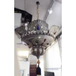 CEILING SHADE, pierced metal of Moorish design with shaped coloured glass inserts, 63cm diam.