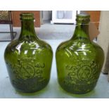 DEMIJON JARS, a pair, green tinted glass, 43cm H. (2)