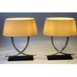 TABLE LAMPS, a pair, chrome crossed horns on black lacquer plinths, 59cm H. (2)