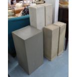 PEDESTALS, a collection of five, including two graduated sandstone pairs and one painted gray
