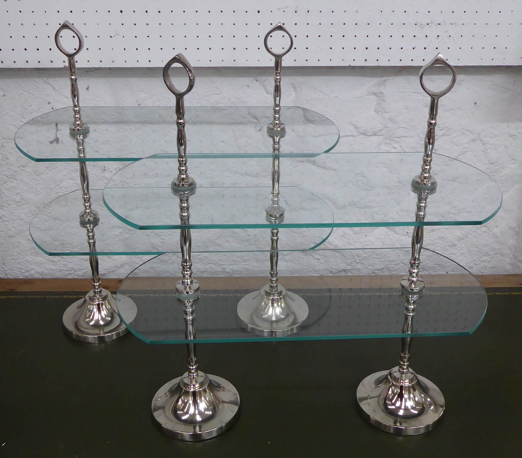 CAKE STANDS, a pair, 1920's French style, glass and polished metal, 45.5cm x 20.5cm x 48cm. (2)