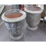 PLANTERS, a pair, aged terracotta, 72cm x 57cm diam. (2)