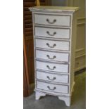 NARROW CHEST, white painted with seven bowed drawers, 120cm H x 53cm x 38cm.