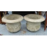 GARDEN PLANTERS ON STANDS, a pair, composite stone, 111cm x 50cm diam. (2)