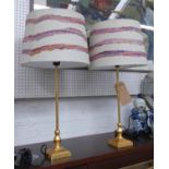 TABLE LAMPS, a pair, gilt metal, with striped shades, 70cm H. (2)