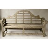 LUTYENS STYLE BENCH, weathered solid teak and slatted after a design by Sir Edwin Lutyens, 197cm W.