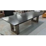 DINING TABLE, contemporary ebonised top, on steel pedestals, 275cm x 130cm x 78cm. (with faults)