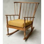 ERCOL ROCKING ARMCHAIR, vintage, beech and elm bentwood, with enclosing stick back, 78cm W.