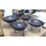 KADI FIRE BOWLS, a set of five, Indian Raj style, various sizes, 51cm diam at largest. (5)