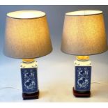 TABLE LAMPS, a pair, Chinese blue and white ceramic of square form, dragon pattern and carved wood