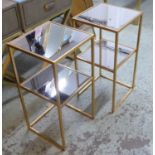 SIDE TABLES, a pair, gilt metal with two square mirrored tiers, 61cm H x 30cm W. (2)