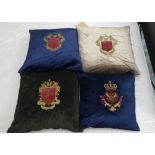 CUSHIONS, a set of four, with embroidered armorial crests, various colours, 44cm x 44cm. (4)