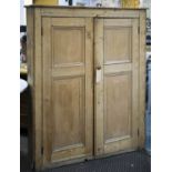 PINE CUPBOARD, Victorian with two panelled doors enclosing shelves, 37cm x 124cm x 151cm H. (with