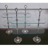 CAKE STANDS, a pair, 1920's French style, glass and polished metal, 45.5cm x 20.5cm x 48cm. (2)
