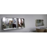 MIRRORED WALL NICHES, a pair polished metal frames, 91cm x 41cm. (2)