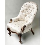 ARMCHAIR, Victorian walnut with 'bee' woven fabric, button back and carved cabriole supports, 58cm