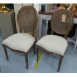 DINING CHAIRS, a set of six, French style with wicker back detail, neutral upholstery, 97cm H. (6)