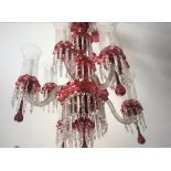 FORTUNY MURANO GLASS CHANDELIER, cranberry, with gilt highlights and hanging pendant lustres, with