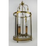 HANGING LANTERN, Regency style, rounded form brass with curved glass the central rod having four