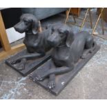 RECUMBENT DOGS, a pair, faux bronze finish, 81cm x 29cm x 49cm. (2)