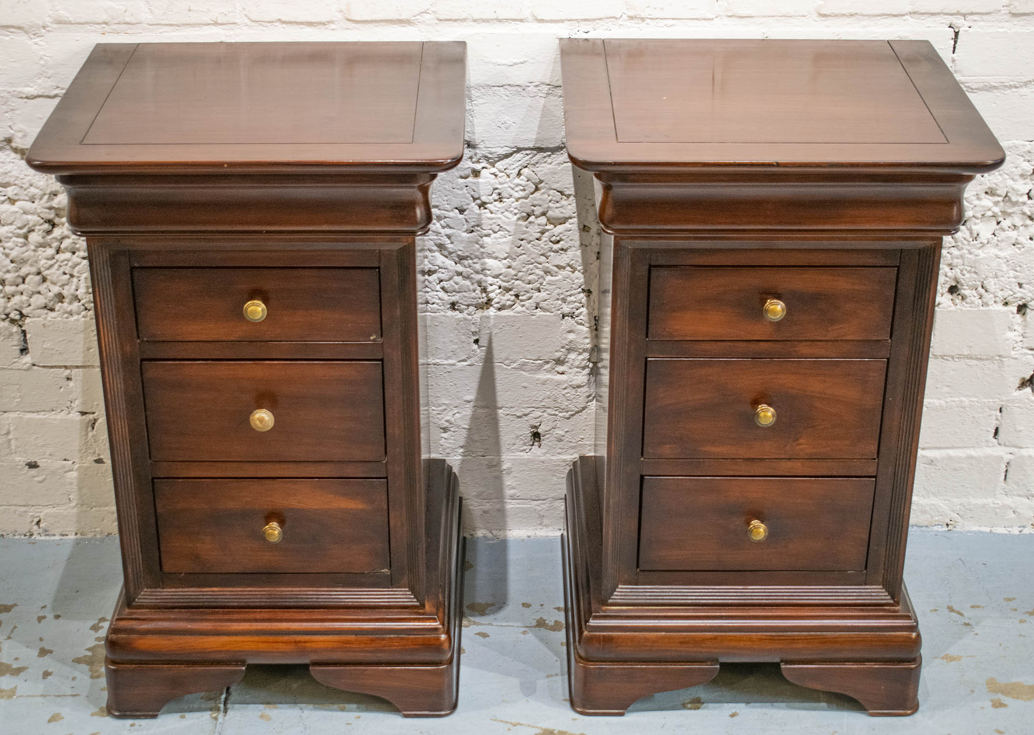 BEDSIDE CHESTS, a pair, Louis Philippe style with four drawers, 70cm H x 45cm W x 41cm D. (2)