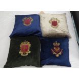 ARMORIAL CUSHIONS, a set of four, embroidered crest, various colours, 44cm x 44cm. (4)