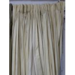 CURTAINS, a pair, lined and interlined, pale yellow woven jab fabric (some fading), 127cm gathered