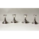 SILVER CANDLESTICKS, Birmingham 1947, a pair, silver, low and weighted together with a similar pair,