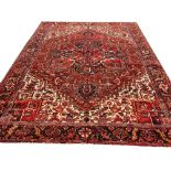 ANTIQUE PERSIAN HERIZ CARPET, 352cm x 278cm.