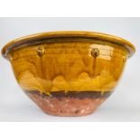 PANCHEON/DAIRY BOWL, of substantial proportions, antique French provincial glazed terracotta, 68cm